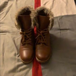 Boots with fur on them
